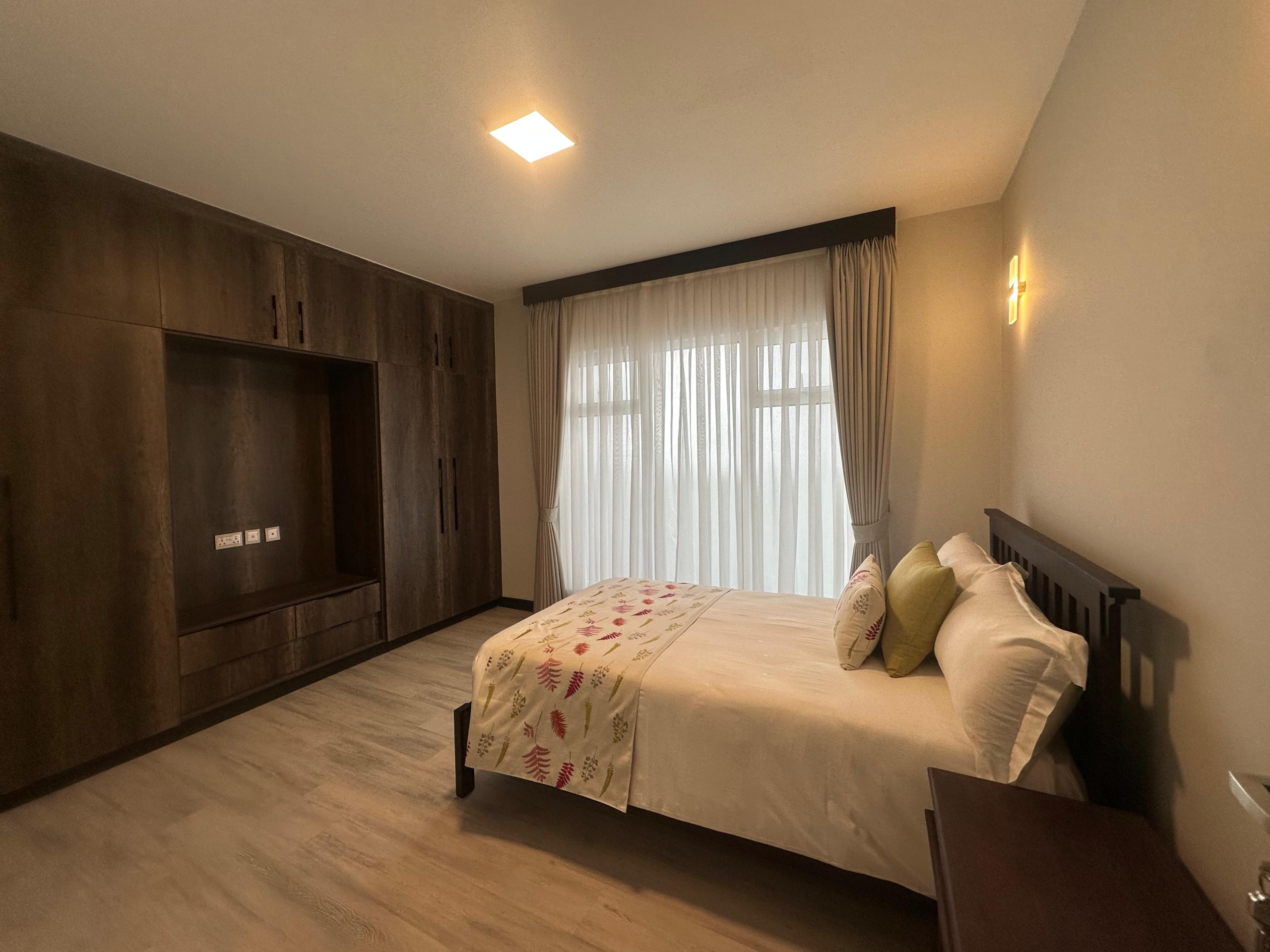 Modern bathroom with glass shower at Pearl Rivers Riverside
