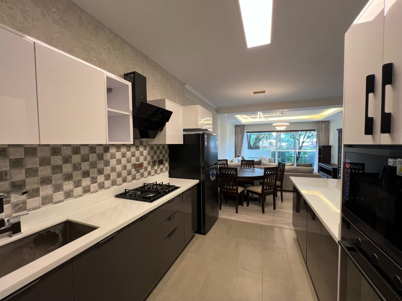 Modern fitted kitchen at Pearl Rivers Riverside apartment