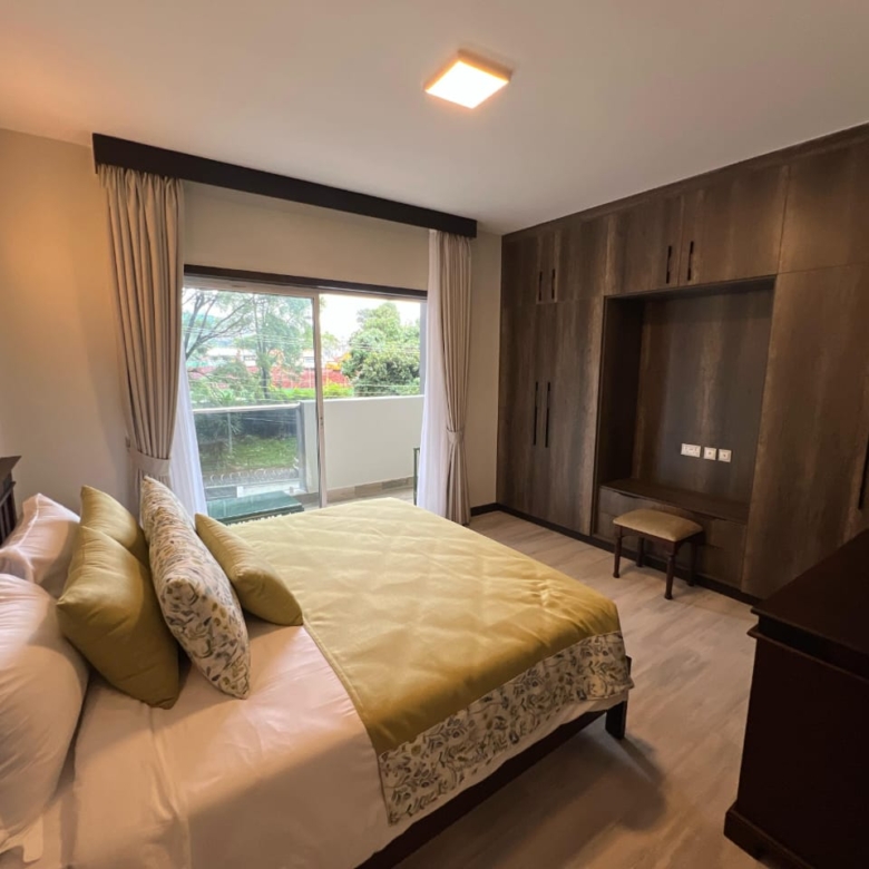 Dining and living area at Pearl Rivers Riverside apartment