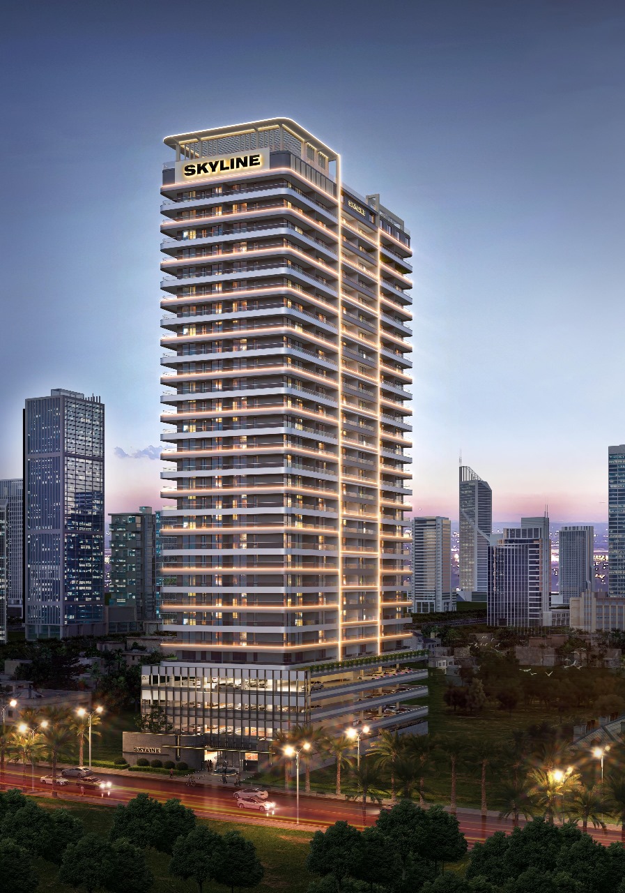 Skyline Apartments luxury high-rise residential tower with illuminated balconies and modern architecture against the evening skyline.