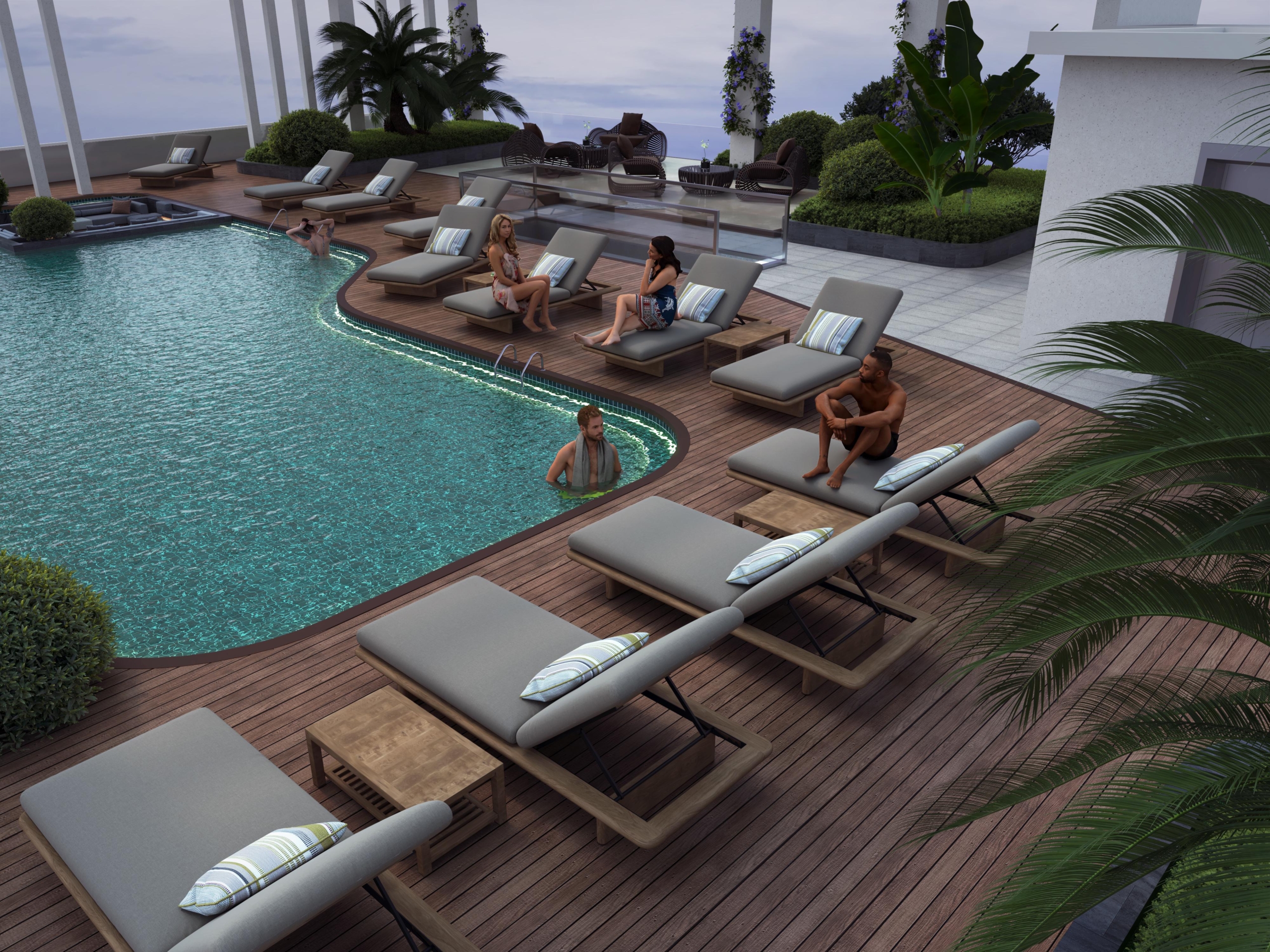 Skyline Apartments outdoor swimming pool with poolside sun loungers, wooden decking, and landscaped relaxation areas.