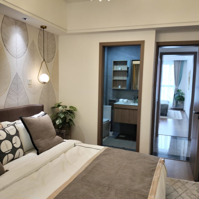 Styled bedroom with en-suite access at Himalaya Horizon apartments in Westlands Nairobi