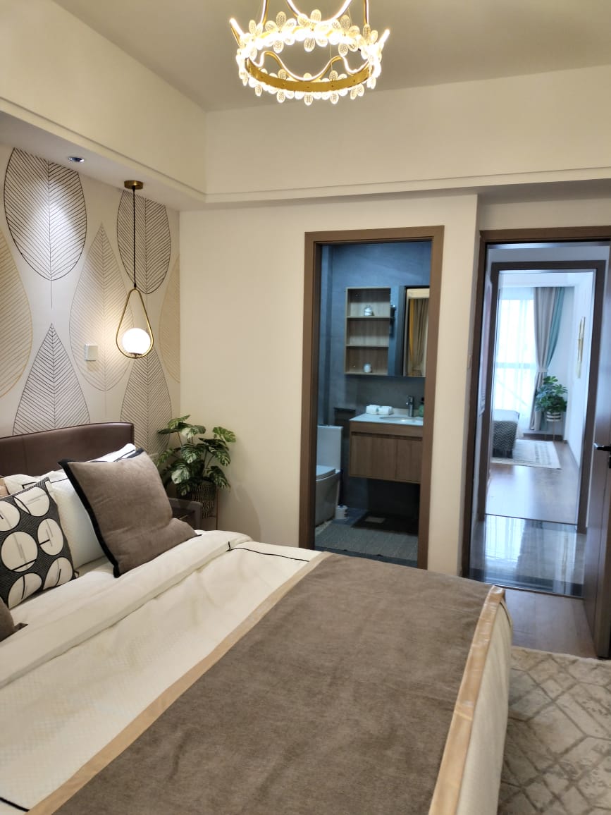 Styled bedroom with en-suite access at Himalaya Horizon apartments in Westlands Nairobi