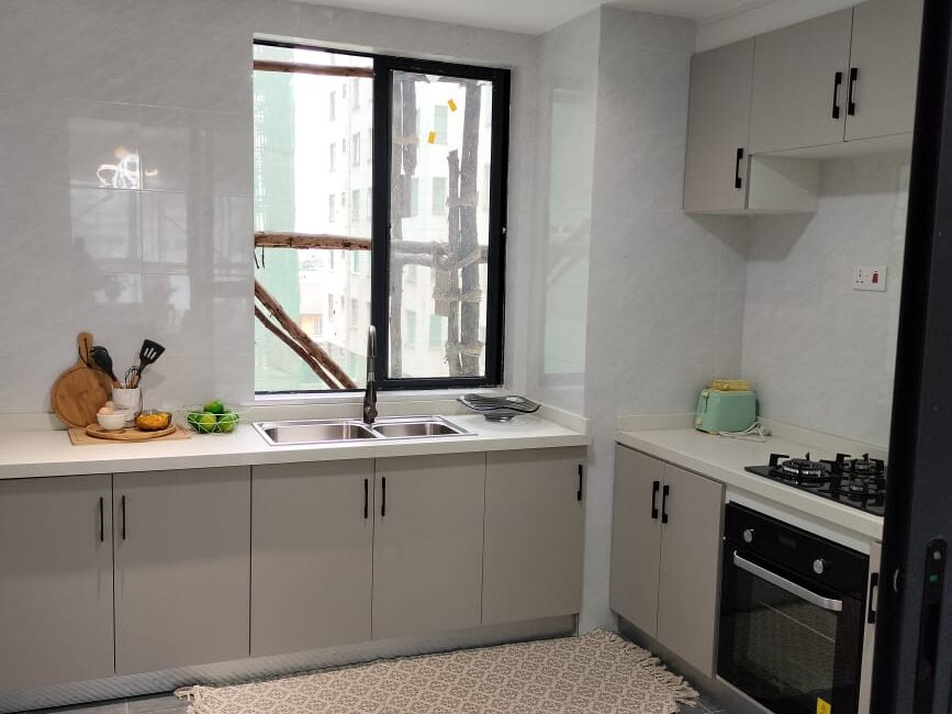 Fitted kitchen with built-in appliances at Himalaya Horizon apartments in Westlands