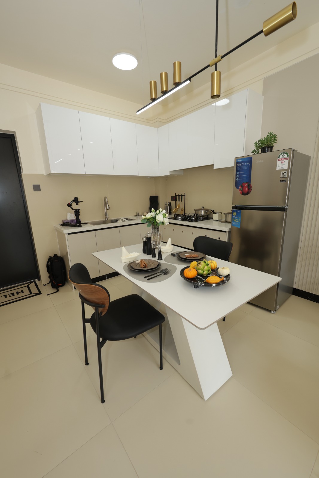Show apartment kitchen and dining area at Luster Arbor Residency in Kileleshwa