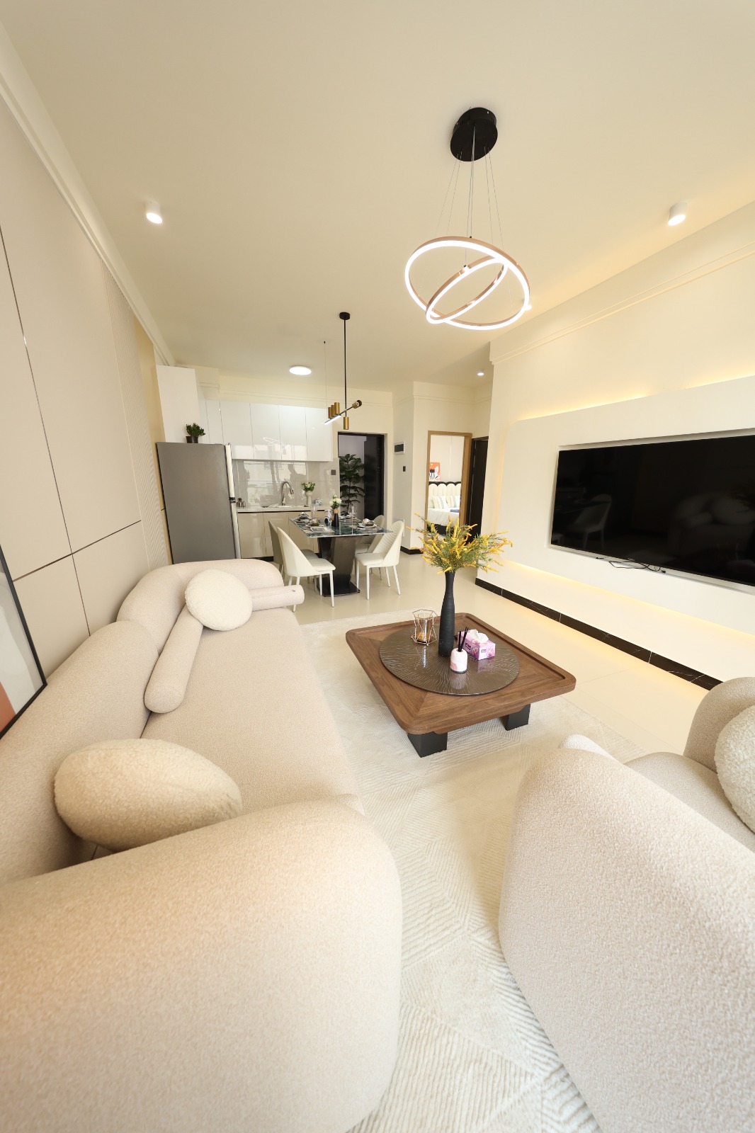 Modern living room with television wall at Luster Arbor Residency in Kileleshwa