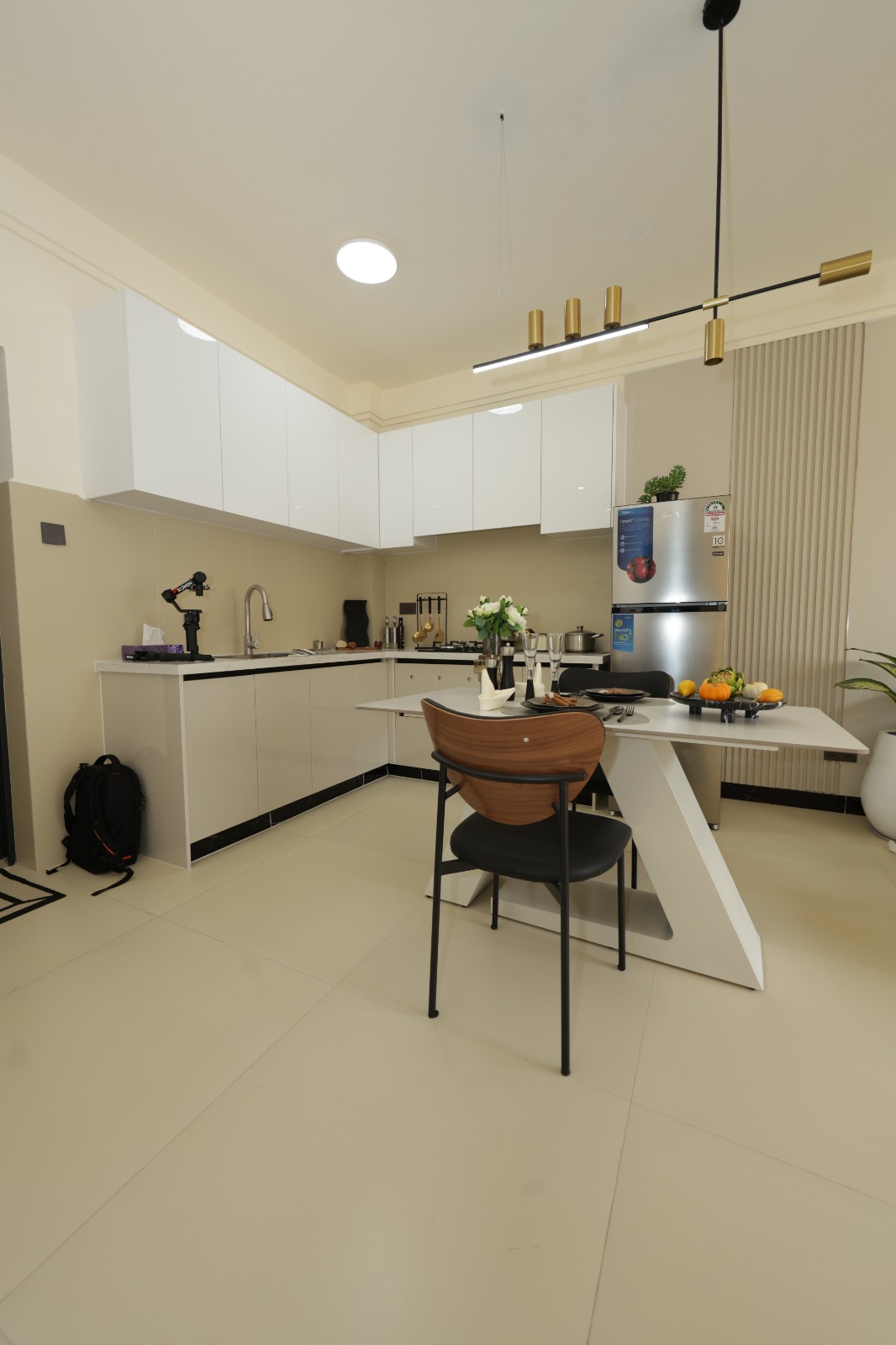 Spacious open-plan kitchen and dining space in a Luster Arbor Residency show apartment