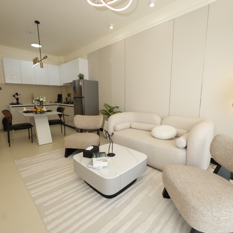 Open-plan show apartment living room and kitchen at Luster Arbor Residency in Kileleshwa