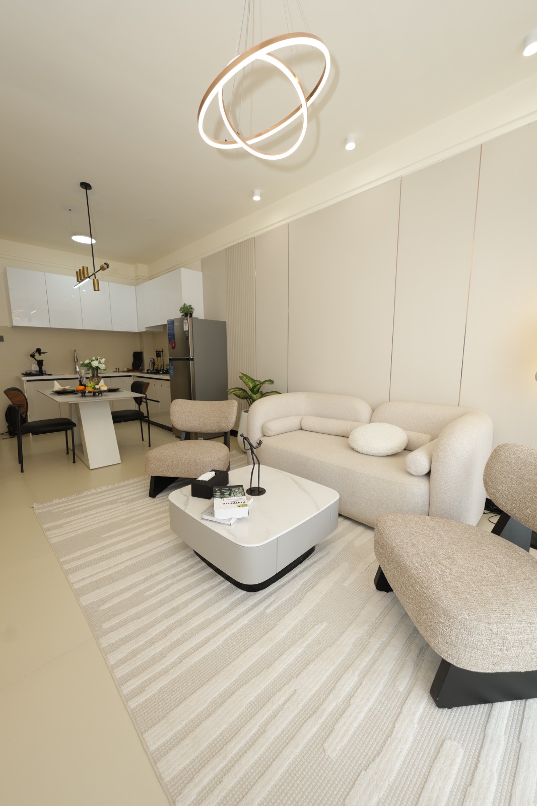 Open-plan show apartment living room and kitchen at Luster Arbor Residency in Kileleshwa