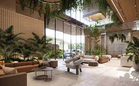 Montbleu apartments luxury residents' lounge featuring floor-to-ceiling glass windows, elegant sofas, contemporary coffee tables, indoor plants, and panoramic city views.