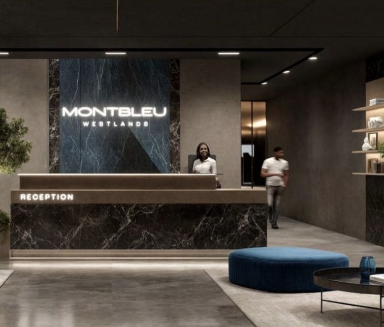 Montbleu apartments Westlands reception lobby rendering featuring a marble-finish reception desk, illuminated Montbleu signage, lounge seating, decorative plants, and modern lighting.