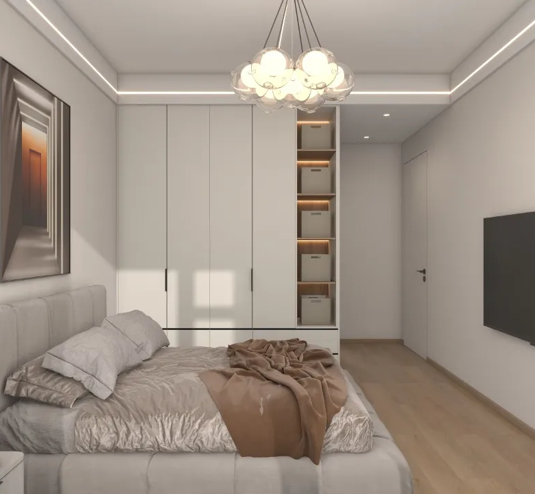 Riara One Residency bedroom with upholstered bed, fitted wardrobes, wall-mounted television, decorative chandelier, and wooden flooring.