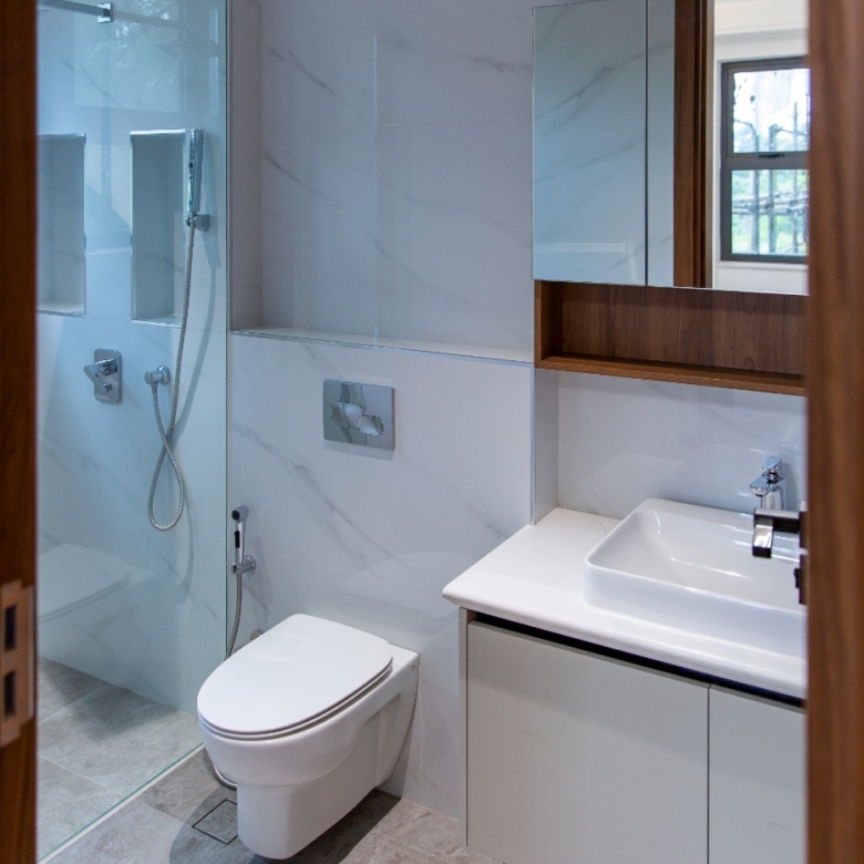Modern guest powder room at Sunset Park Apartments