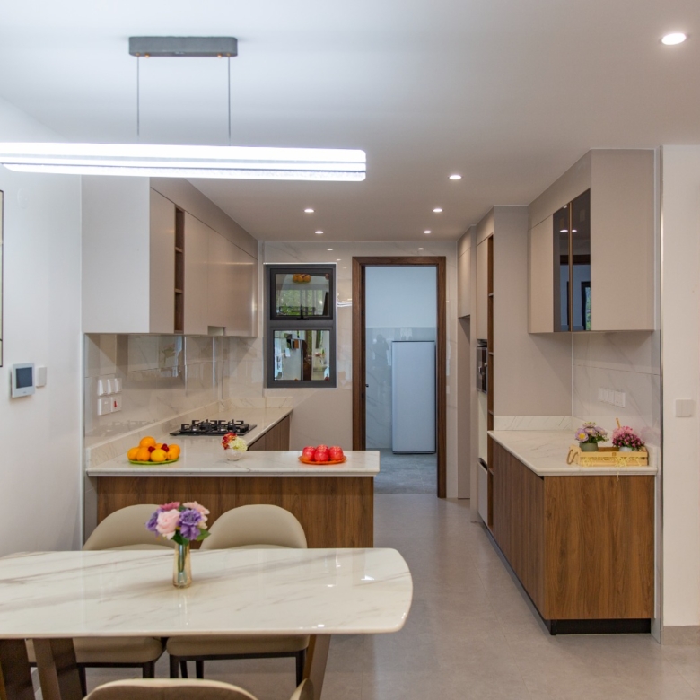 Dining area overlooking the fitted kitchen at Sunset Park Apartments