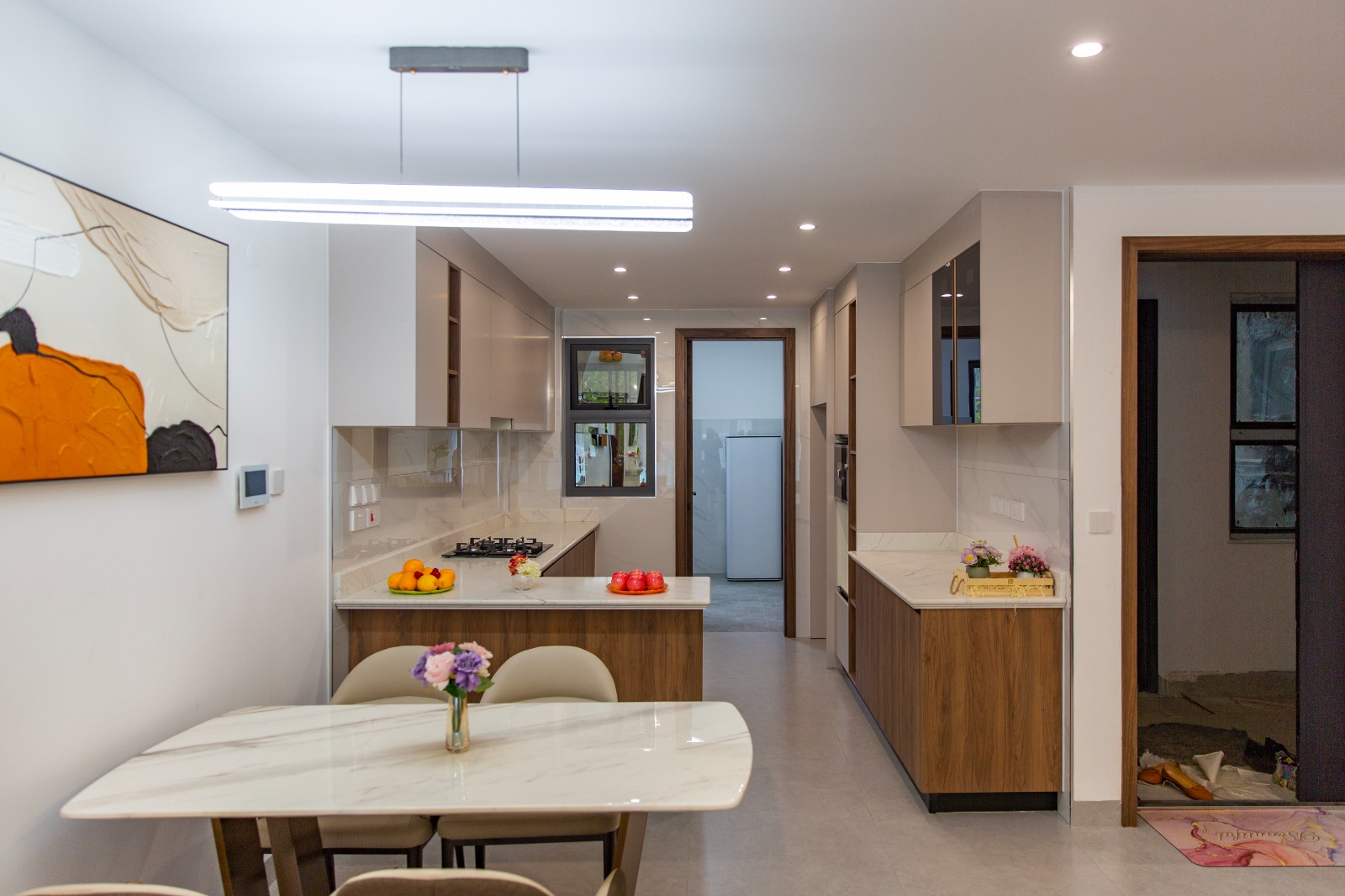 Dining area overlooking the fitted kitchen at Sunset Park Apartments