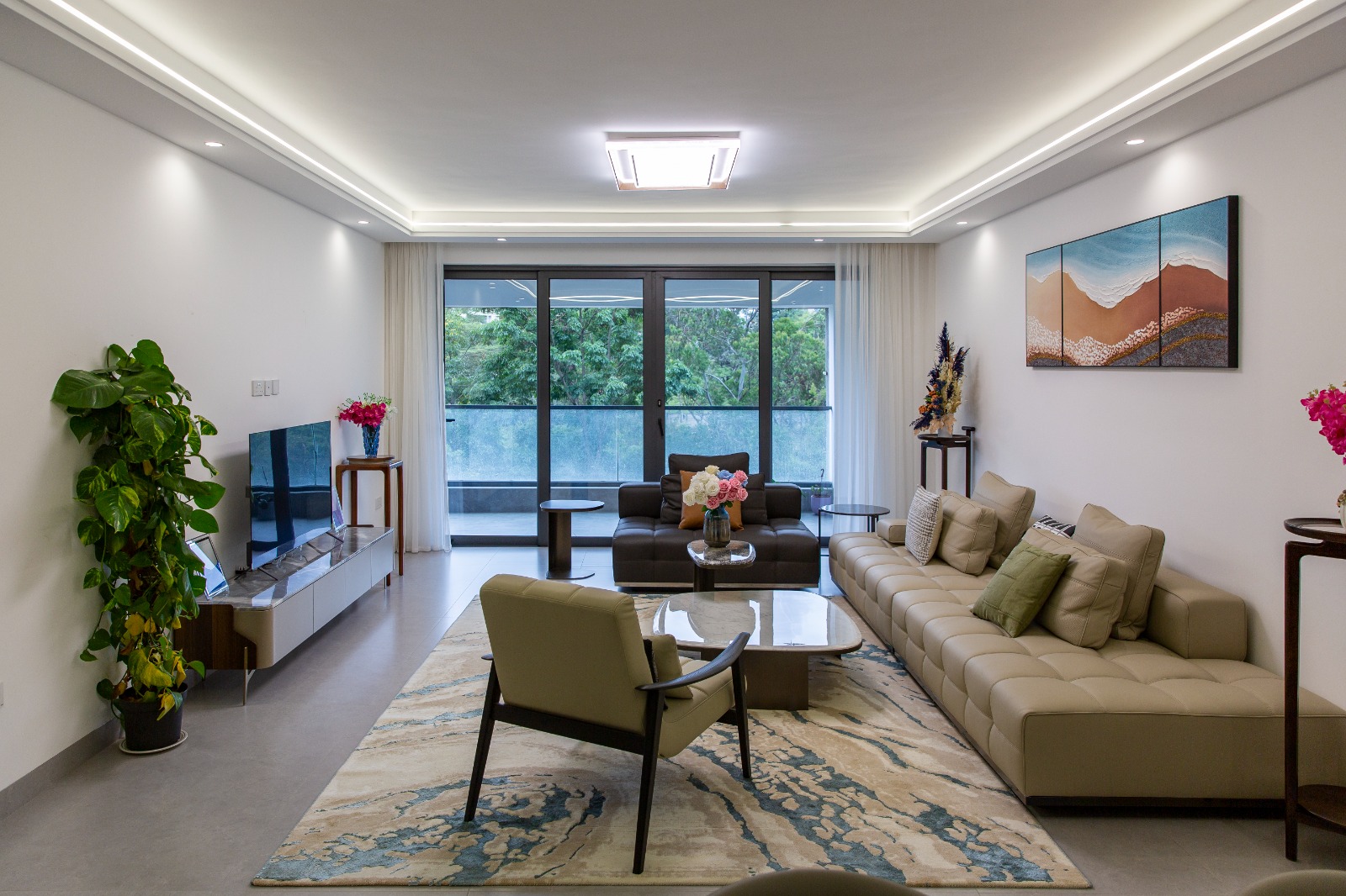 Spacious living room with balcony access at Sunset Park Apartments