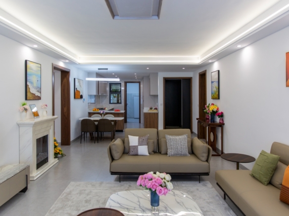 Furnished living room overlooking the kitchen at Sunset Park Apartments