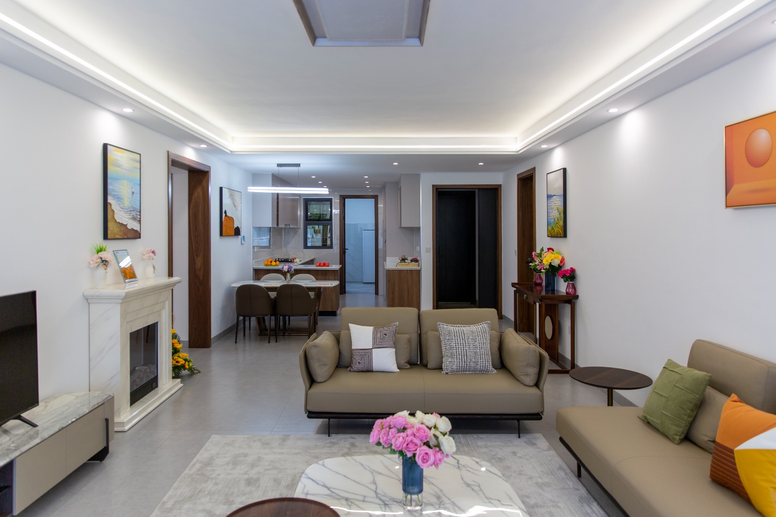 Furnished living room overlooking the kitchen at Sunset Park Apartments