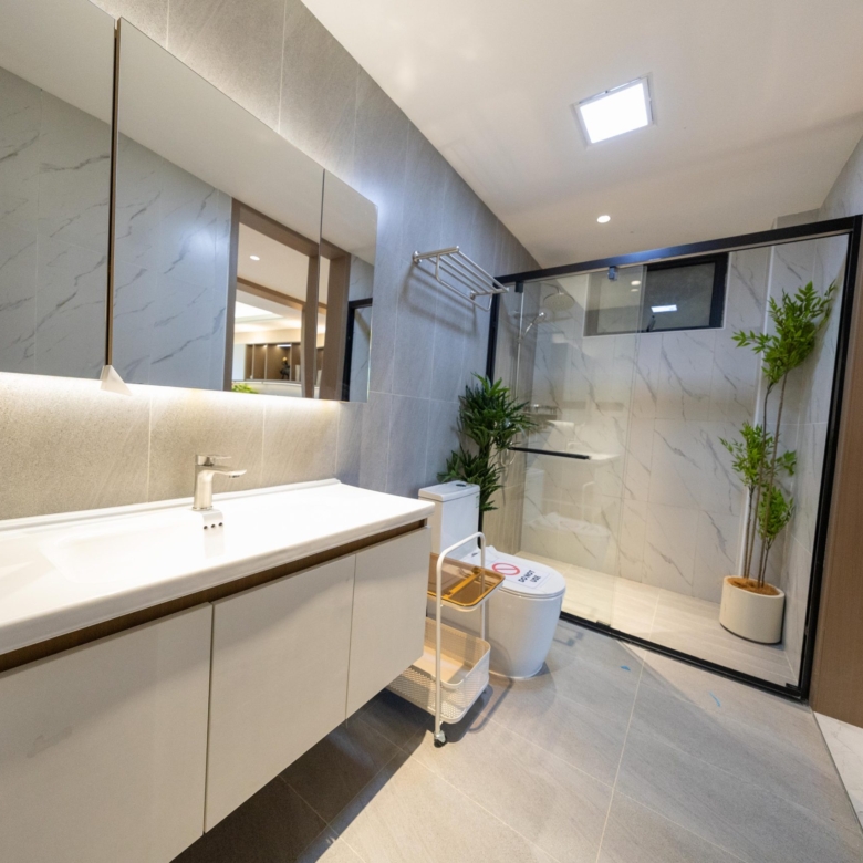 Modern bathroom with glass shower at Himalaya Horizon apartments in Westlands