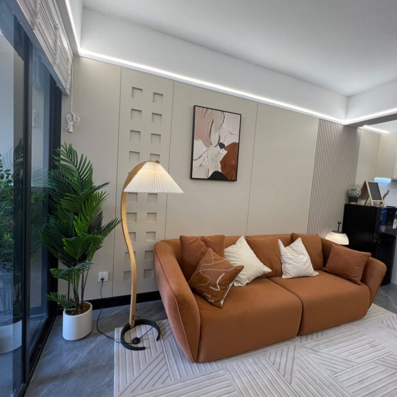 Luxury lounge area at Ten50 Residences featuring contemporary furniture and lighting.
