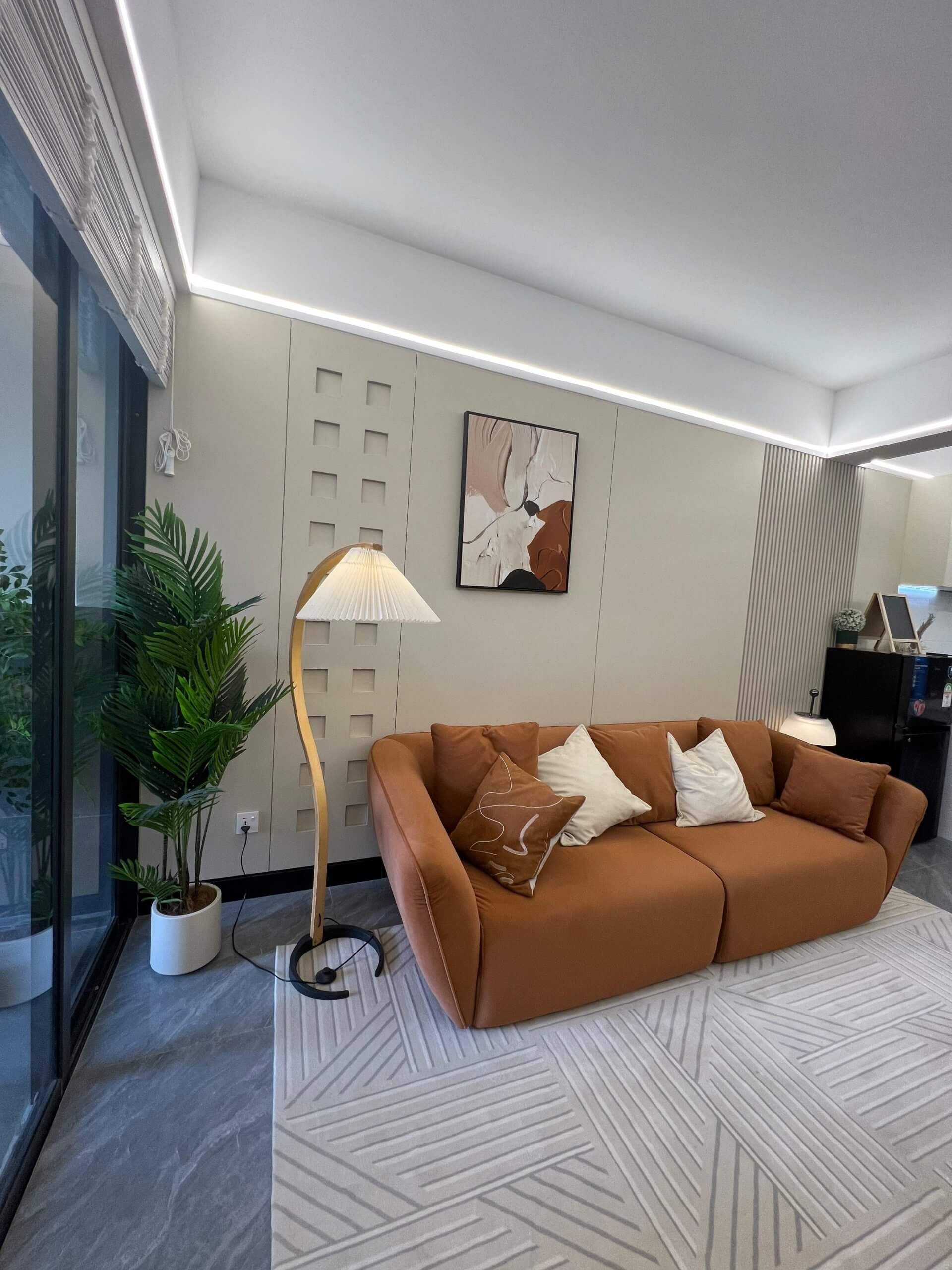 Luxury lounge area at Ten50 Residences featuring contemporary furniture and lighting.