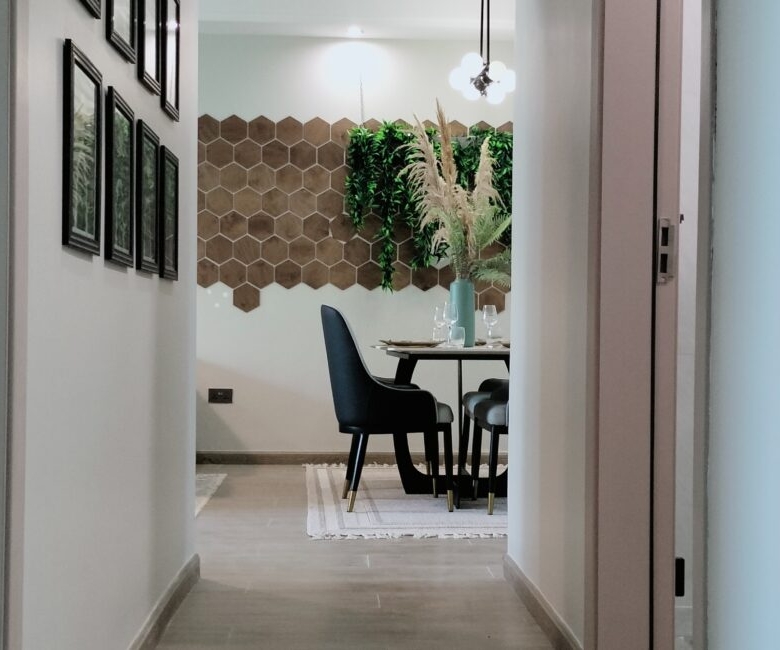 iti Rise Residency in Westlands apartment hallway leading to dining area with decorative wall panels