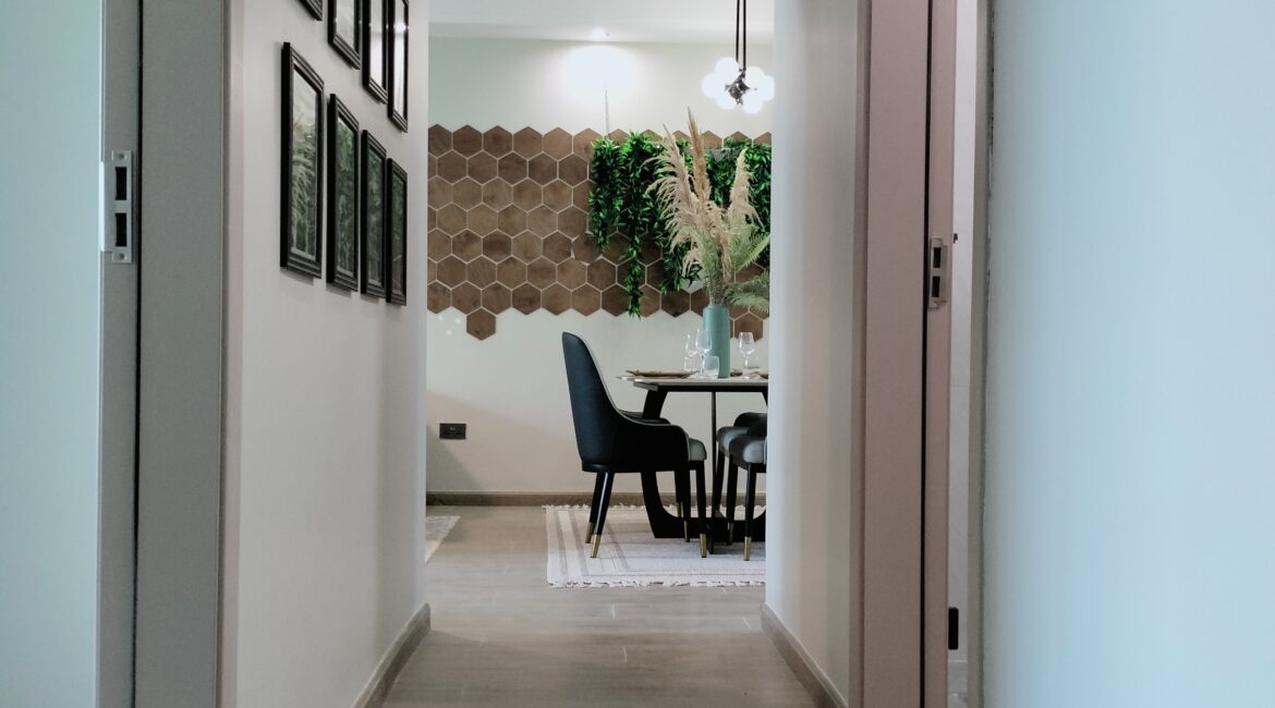 iti Rise Residency in Westlands apartment hallway leading to dining area with decorative wall panels