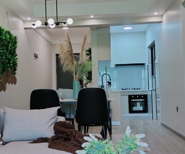 Citi Rise Residency in Westlands open plan living room with dining area and fitted kitchen