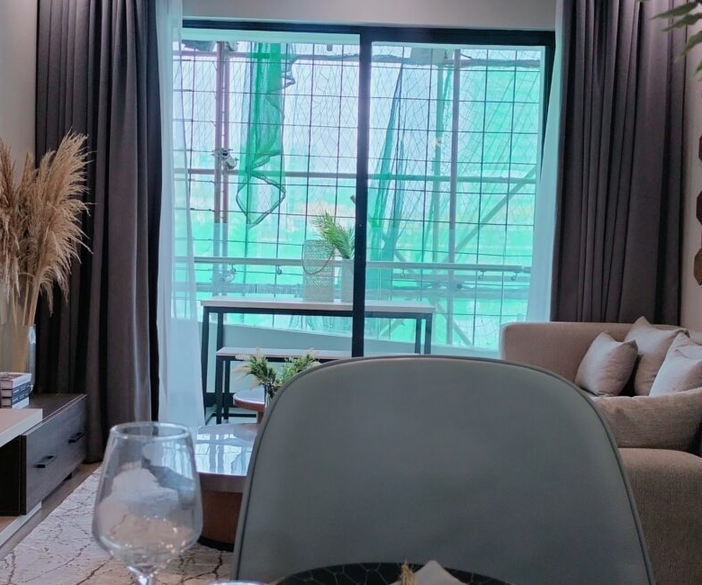 Citi Rise Residency in Westlands living room with dining area, balcony doors and contemporary interior styling