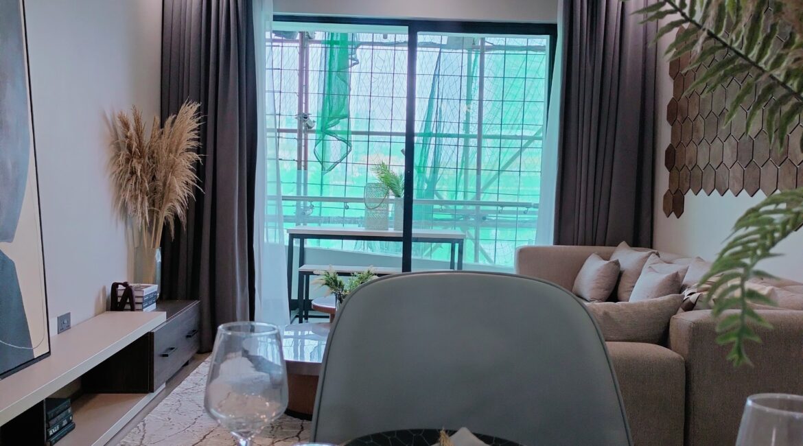 Citi Rise Residency in Westlands living room with dining area, balcony doors and contemporary interior styling