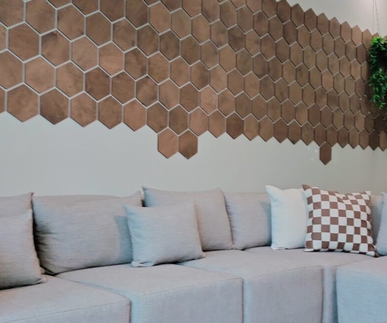 Citi Rise Residency in Westlands lounge with sofa, decorative wall panels and indoor greenery