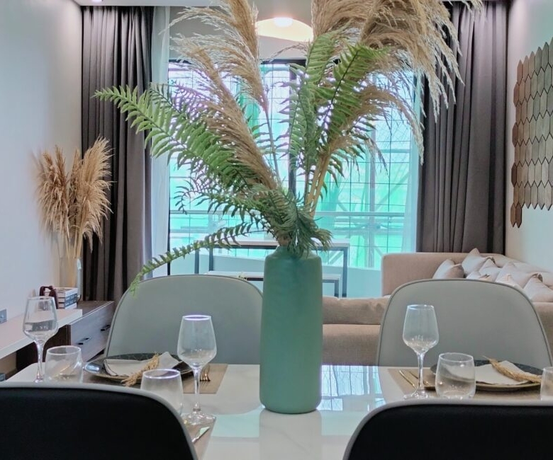 Citi Rise Residency in Westlands open plan dining and living room with balcony access and modern decor