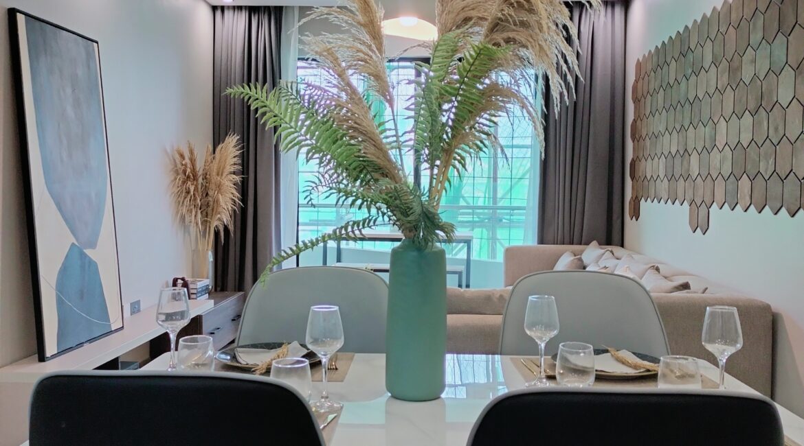 Citi Rise Residency in Westlands open plan dining and living room with balcony access and modern decor