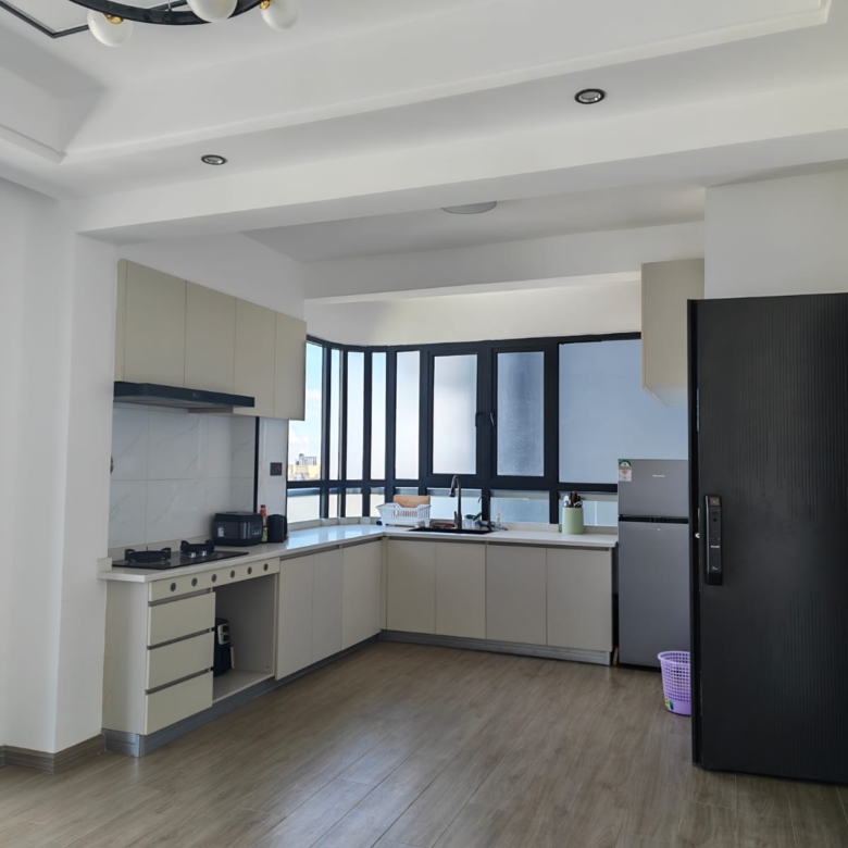 Close-up of premium kitchen finishes and dual-sink setup at Oak Classic Residency.