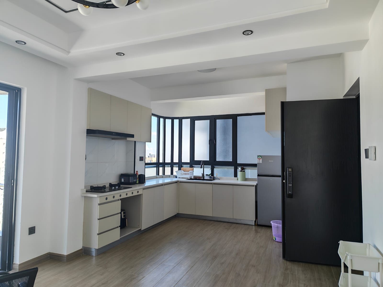 Close-up of premium kitchen finishes and dual-sink setup at Oak Classic Residency.