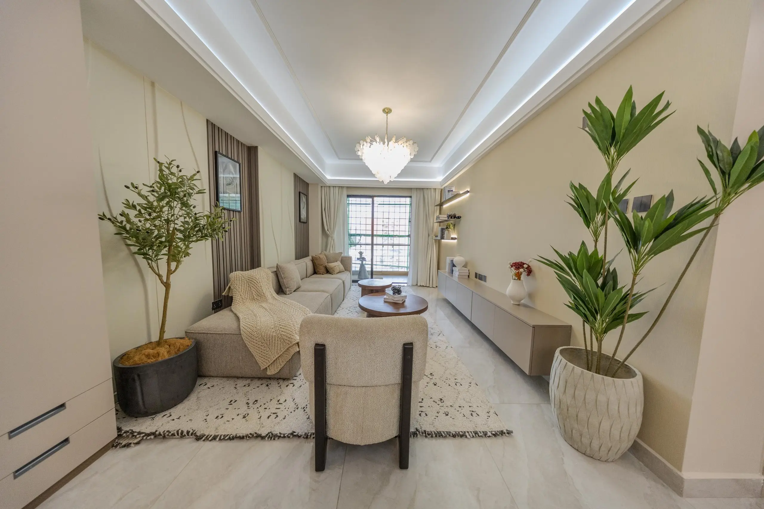 Furnished show-apartment living room at Oak West Residency in Westlands