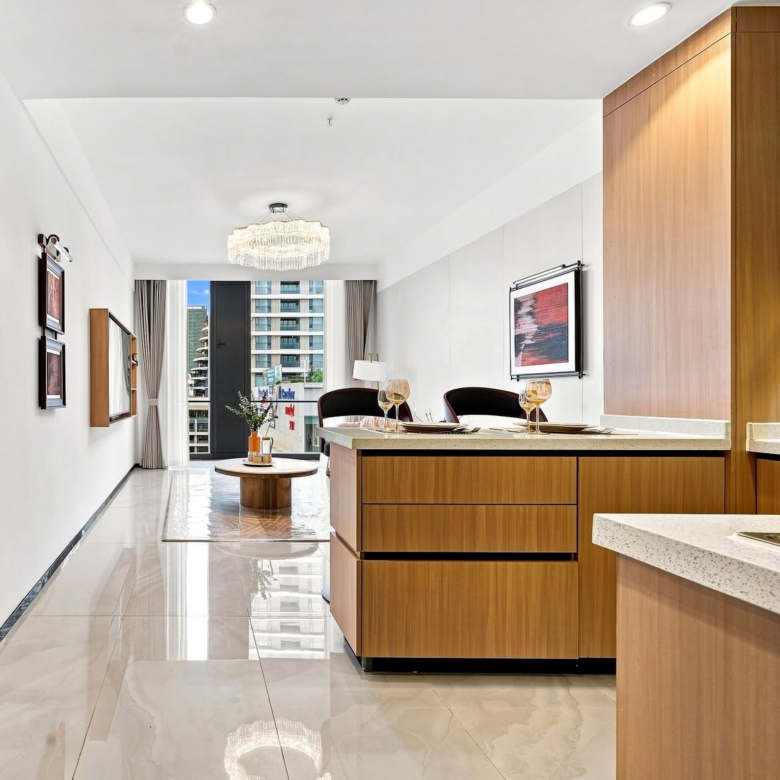 Modern fitted kitchen with breakfast counter in a Stellar Bay Westlands apartment