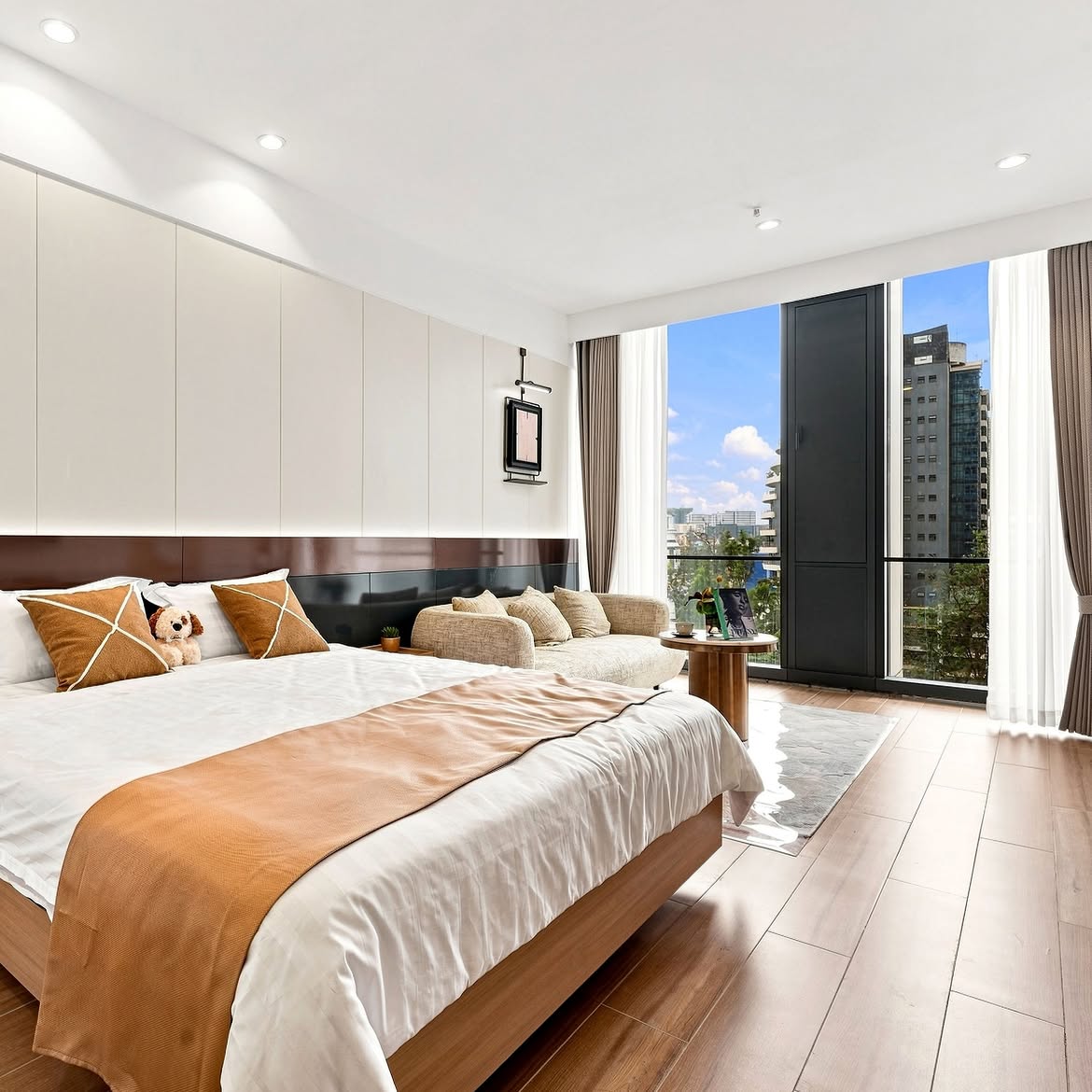 Spacious modern bedroom with large windows at Stellar Bay Westlands