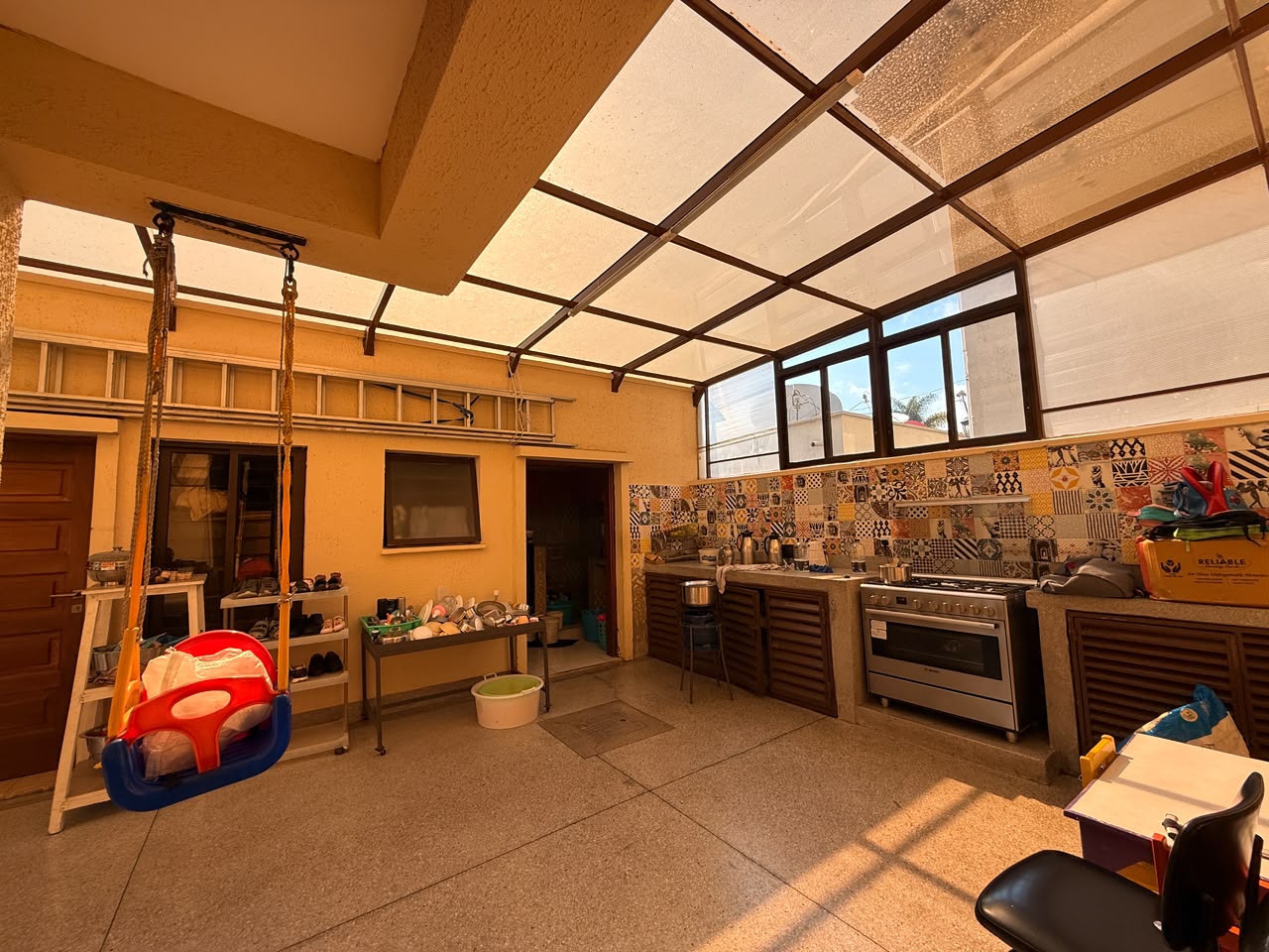 Covered outdoor kitchen and utility area at Convent Oaks Lavington