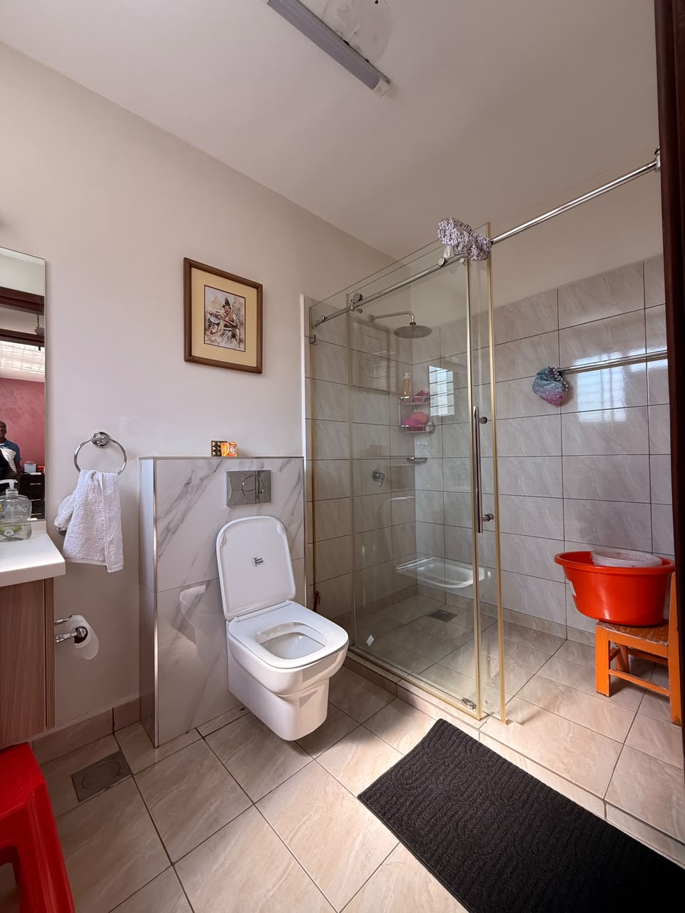 Bathroom with glass-enclosed shower at Convent Oaks Lavington townhouse