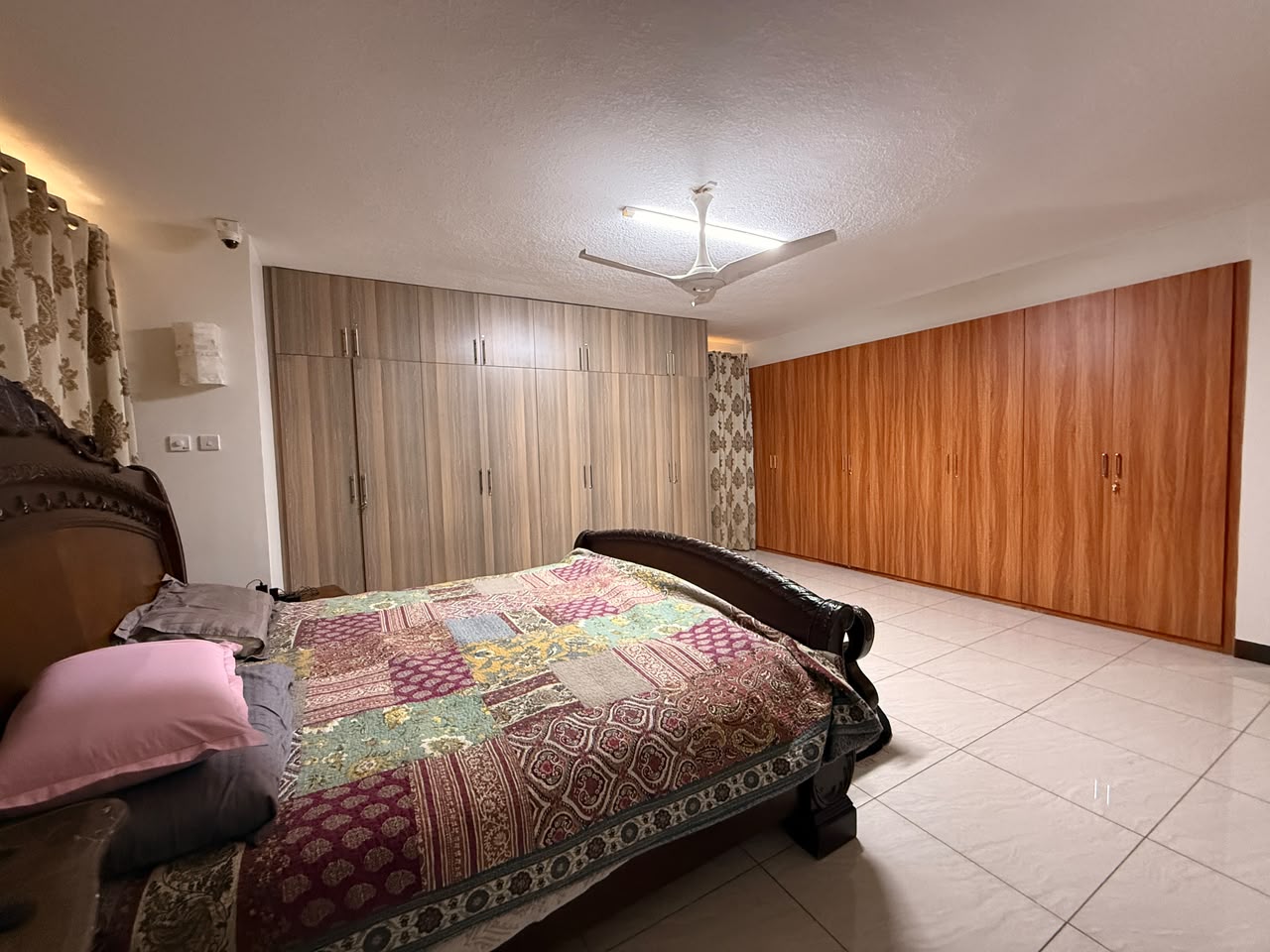 Large principal bedroom with extensive wardrobes at Convent Oaks Lavington