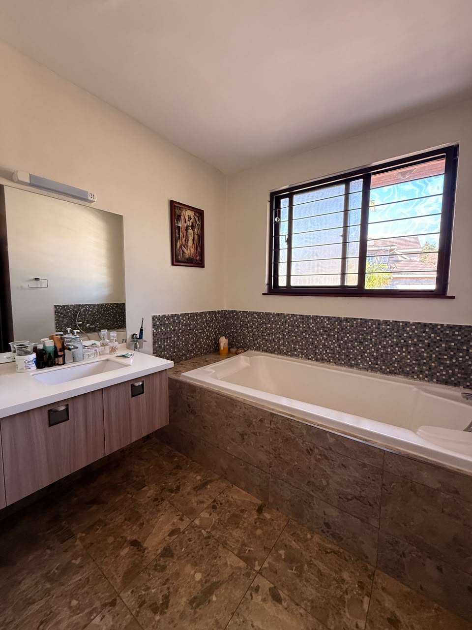 Principal bathroom with bathtub and vanity at Convent Oaks Lavington