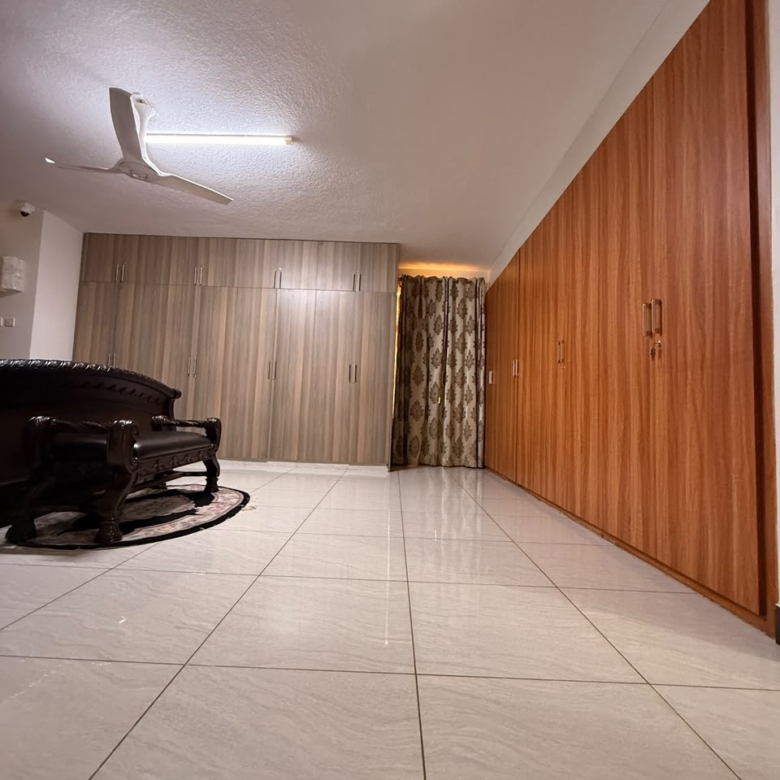 pacious principal bedroom with full-wall wardrobes at Convent Oaks Lavington