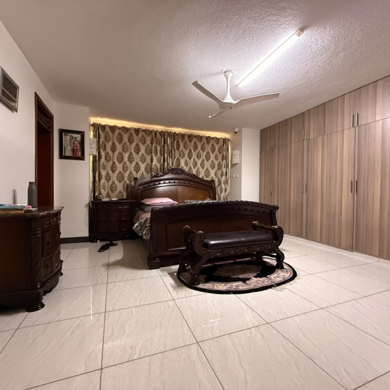 Principal suite with full-length storage cabinets at Convent Oaks Lavington
