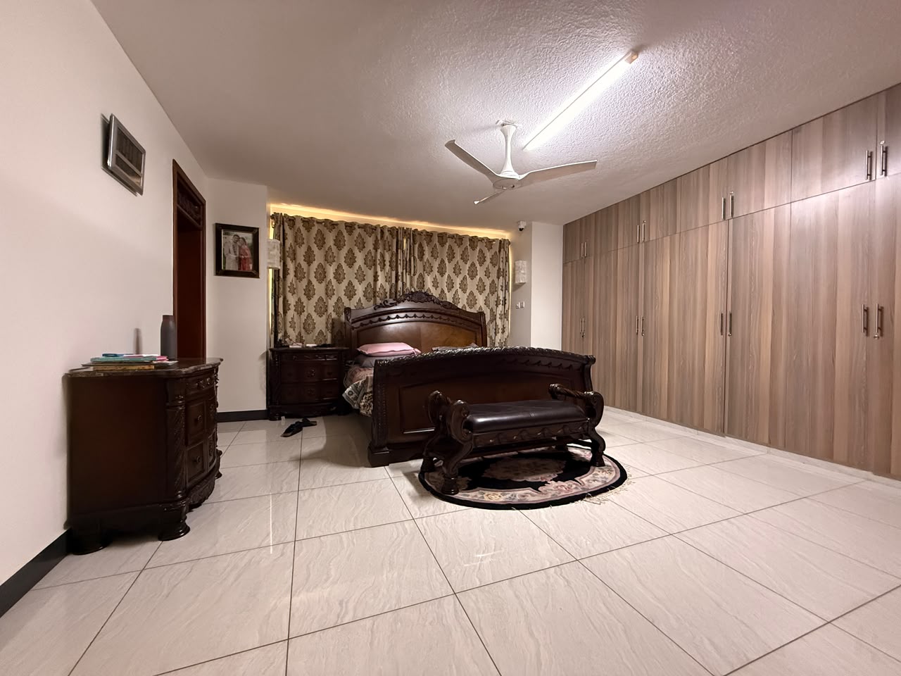 Principal suite with full-length storage cabinets at Convent Oaks Lavington