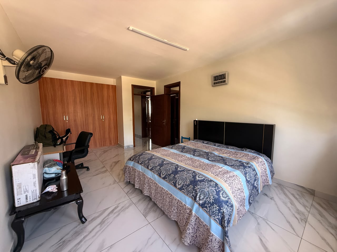 Spacious guest bedroom with built-in wardrobes at Convent Oaks Lavington