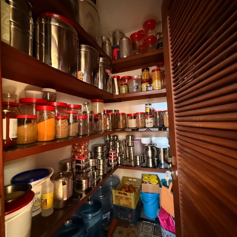 Walk-in kitchen pantry with extensive shelving at Convent Oaks Lavington