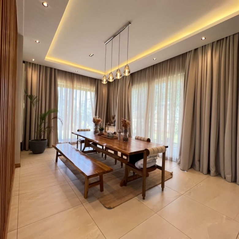 Luxury villa dining area with garden-facing windows in Loresho