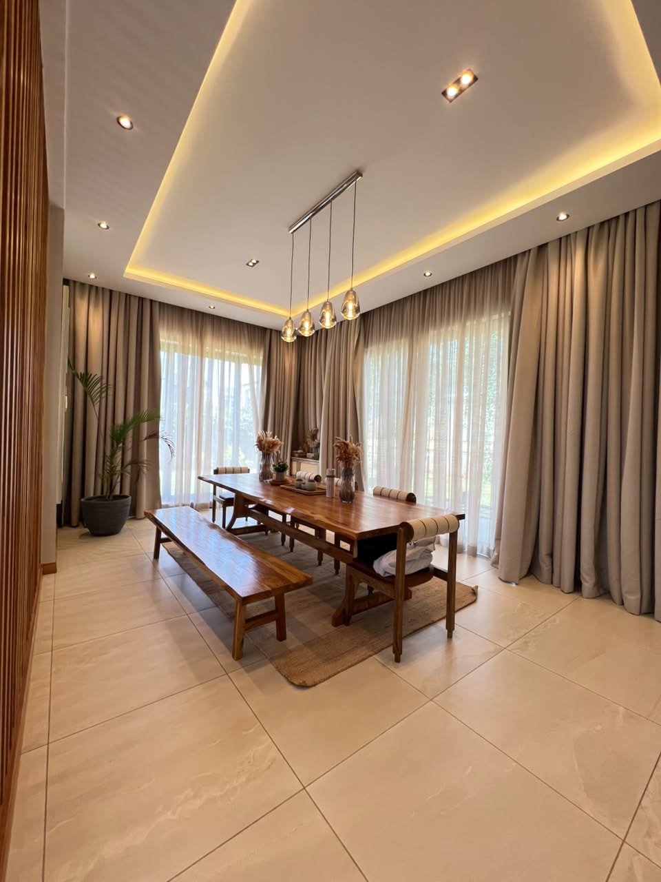 Luxury villa dining area with garden-facing windows in Loresho