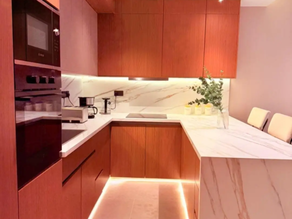 Contemporary fitted kitchen with marble breakfast counter at Silva Gigiri